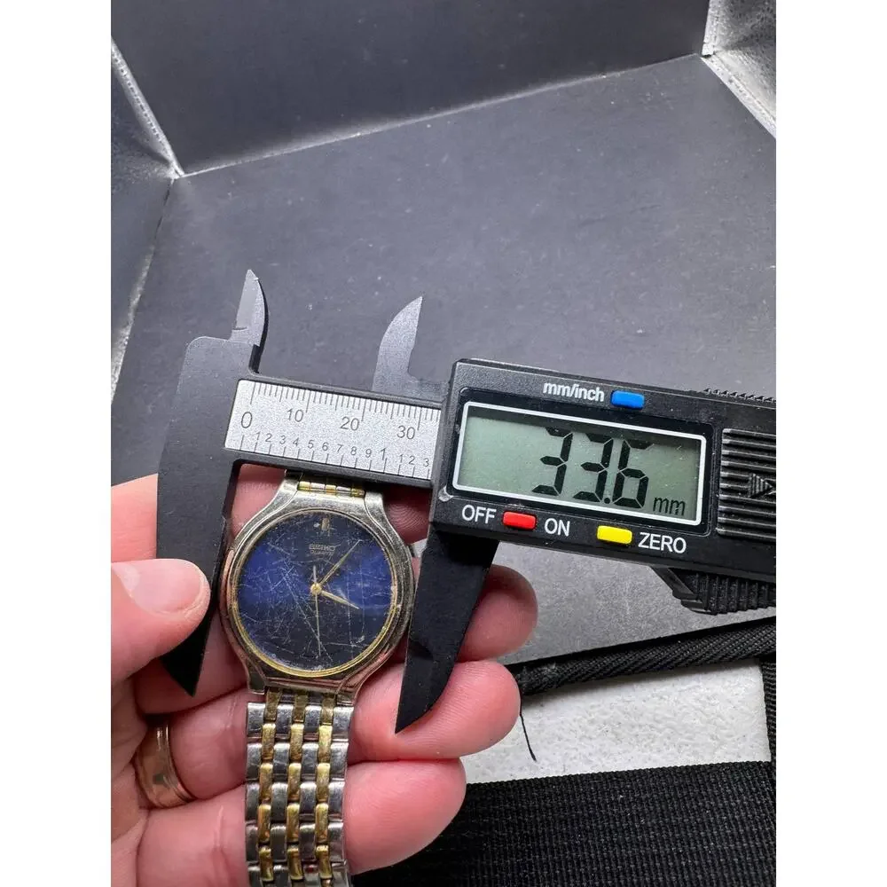 Seiko V701-1K29 Two Tone Quartz Wristwatch Blue Dial Silver Gold Bracelet